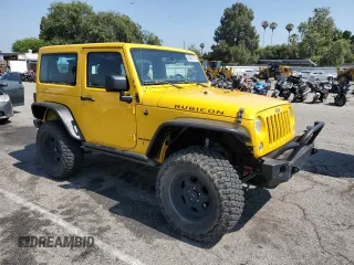 2015 Jeep Wrangler Rubicon Hard Rock with VIN 1C4BJWCG6FL568665, listed as a Copart auction lot 60282155 with 107,773 mi miles and Salvage title. Bid and sale history available at DreamBid. Image 4.
