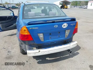 2003 Suzuki Aerio S z VIN JS2RA41S735169831, wystawiony jako IAAI lot #42025965 z przebiegiem 214 238 mil mil oraz . Historia ofert i sprzedaży dostępna na DreamBid. Obrazek 6.