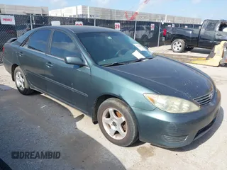 2006 Toyota Camry STD with VIN 4T1BE32KX6U124929, listed as a IAAI auction lot 42561585 with 412,867 mi miles and . Bid and sale history available at DreamBid. Image 1.