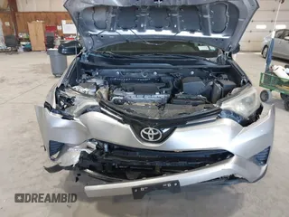 2017 Toyota RAV4 LE with VIN 2T3BFREV6HW642228, listed as a IAAI auction lot 41832543 with 127,830 mi miles. Bid and sale history available at carsss.com. Image 6.