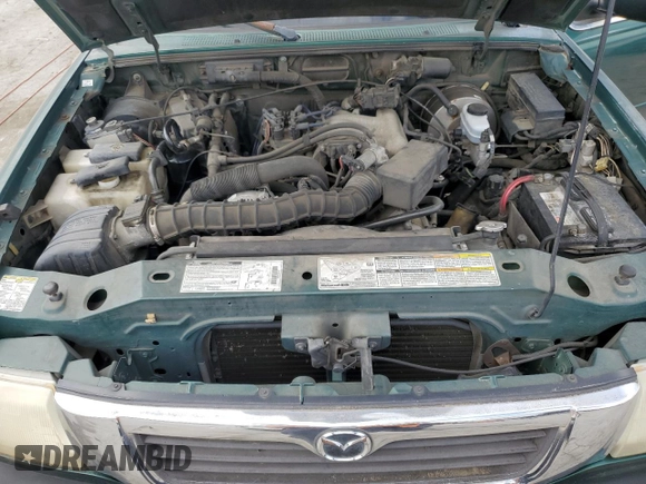 1999 Mazda B-Series 2WD Truck SE with VIN 4F4YR16VXXTM26442, listed as a Copart auction lot 54518674 with 184,041 mi miles and Salvage Title. Bid and sale history available at carsss.com. Image 11.