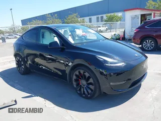 2022 Tesla Model Y Performance with VIN 7SAYGDEF0NF490213, listed as a IAAI auction lot 42373723 with 63,363 mi miles and . Bid and sale history available at DreamBid. Image 1.