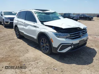 2022 Volkswagen Tiguan SE with VIN 3VV2B7AX2NM010932, listed as a IAAI auction lot 42007364 with 26,014 mi miles and . Bid and sale history available at DreamBid. Image 1.
