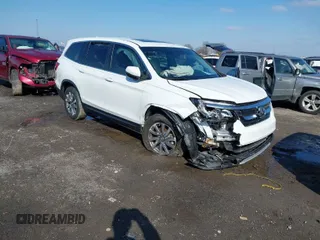 2021 Honda Pilot EX-L with VIN 5FNYF5H57MB037861, listed as a IAAI auction lot 41566924 with 42,867 mi miles. Bid and sale history available at carsss.com. Image 1.