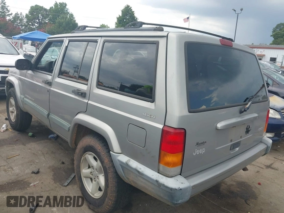 2000 Jeep Cherokee with VIN 1J4FF48S7YL220827, listed as a IAAI auction lot 42871669 with 146,466 mi miles and . Bid and sale history available at DreamBid. Image 3.