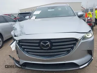 2023 Mazda CX-9 Carbon Edition with VIN JM3TCBDY7P0638506, listed as a IAAI auction lot 41889425 with 60,471 mi miles and . Bid and sale history available at carsss.com. Image 12.