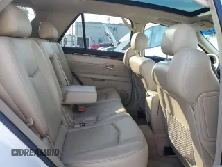 2009 Cadillac SRX RWD z VIN 1GYEE637590113453, wystawiony jako Copart lot #42596675 z przebiegiem 115 118 mil mil oraz Szkoda całkowita • Salvage title. Historia ofert i sprzedaży dostępna na DreamBid. Obrazek 11.
