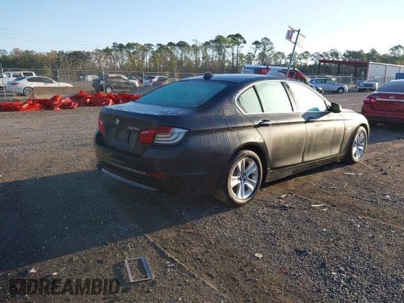 2013 BMW 5 Series 528i with VIN WBAXG5C56DDY31724, listed as a IAAI auction lot 41530179 with 117,876 mi miles and . Bid and sale history available at carsss.com. Image 4.