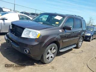 2012 Honda Pilot Touring with VIN 5FNYF4H9XCB083406, listed as a IAAI auction lot 42107651 with 217,678 mi miles. Bid and sale history available at carsss.com. Image 18.