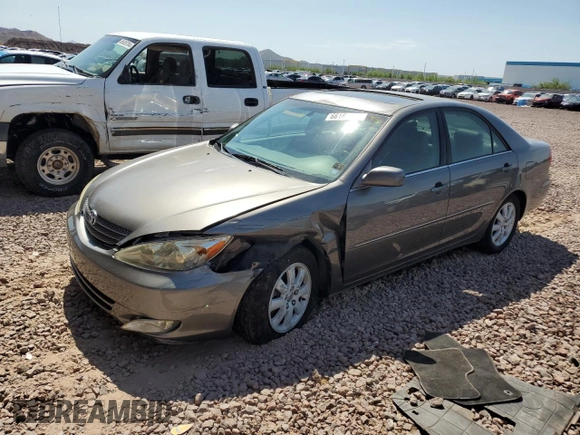 2004 Toyota Camry LE with VIN 4T1BF30K24U569209, listed as a Copart auction lot 66181644 with 186,412 mi miles and Salvage Title. Bid and sale history available at carsss.com. Image 1.