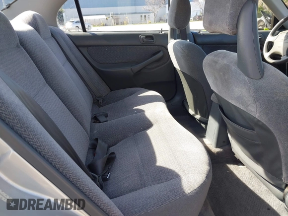 1999 Honda Civic LX with VIN JHMEJ6670XS000958, listed as a IAAI auction lot 41620949 with 93,698 mi miles and . Bid and sale history available at DreamBid. Image 8.