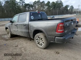 2020 Ram 1500 Laramie with VIN 1C6SRFJM3LN212084, listed as a Copart auction lot 45580665 with 113,962 mi miles and Salvage title. Bid and sale history available at DreamBid. Image 2.