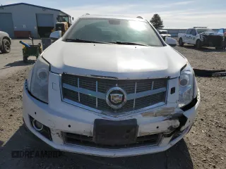 2012 Cadillac SRX Premium Collection with VIN 3GYFNFE39CS515037, listed as a Copart auction lot 55797235 with 146,778 mi miles and Salvage title. Bid and sale history available at DreamBid. Image 5.