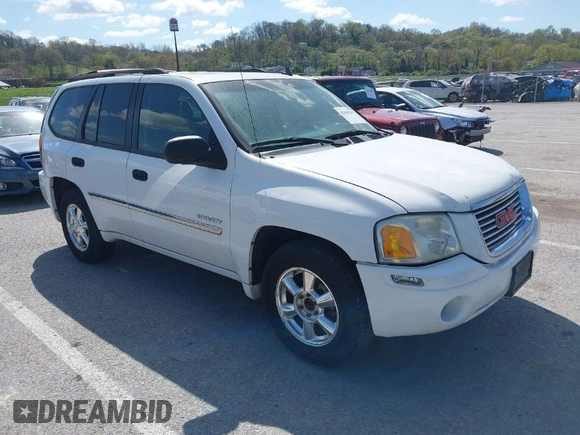 2006 GMC Envoy SLE with VIN 1GKDT13SX62258586, listed as a IAAI auction lot 42045967 with 143,225 mi miles. Bid and sale history available at carsss.com. Image 1.