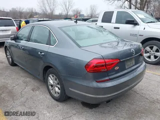 2016 Volkswagen Passat 1.8T S with VIN 1VWAS7A31GC052520, listed as a IAAI auction lot 41547408 with 129,730 mi miles. Bid and sale history available at carsss.com. Image 3.