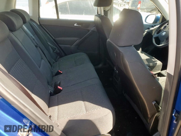 2010 Volkswagen Tiguan Wolfsburg Edition z VIN WVGAV7AXXAW004058, wystawiony jako Copart lot #50976575 z przebiegiem 83 620 mil mil oraz Szkoda całkowita • Salvage title. Historia ofert i sprzedaży dostępna na DreamBid. Obrazek 11.