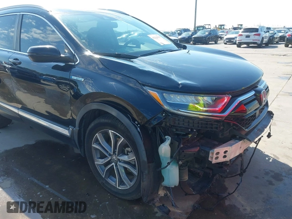 2020 Honda CR-V Touring z VIN 7FART6H91LE005707, wystawiony jako IAAI lot #42326337 z przebiegiem 40 555 mil mil oraz . Historia ofert i sprzedaży dostępna na DreamBid. Obrazek 19.