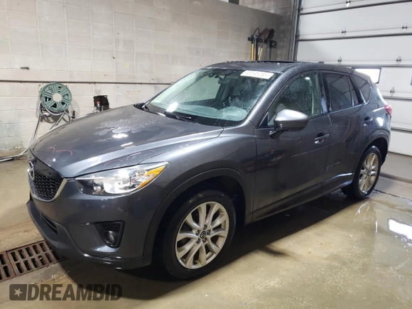 2015 Mazda CX-5 Grand Touring with VIN JM3KE4DY1F0454713, listed as a Copart auction lot 48548285 with 132,454 mi miles and Salvage Title. Bid and sale history available at DreamBid. Image 1.