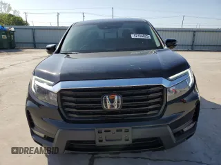 2023 Honda Ridgeline RTL-E with VIN 5FPYK3F72PB001592, listed as a Copart auction lot 52154625 with 41,153 mi miles and Salvage title. Bid and sale history available at DreamBid. Image 5.
