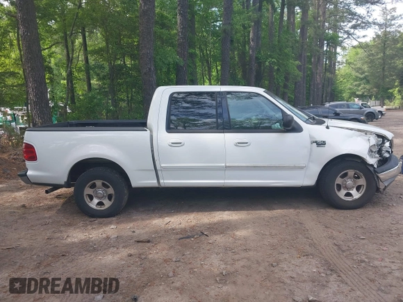 2003 Ford F-150 XLT with VIN 1FTRW07663KD69809, listed as a IAAI auction lot 42198549 with 166,466 mi miles and . Bid and sale history available at DreamBid. Image 13.