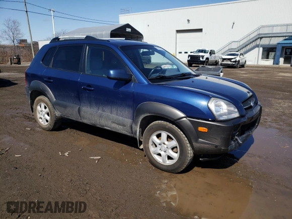 2005 Hyundai Tucson GL with VIN KM8JM72D55U167063, listed as a Copart auction lot 52002865 with 157,945 mi miles and Salvage Title. Bid and sale history available at carsss.com. Image 4.