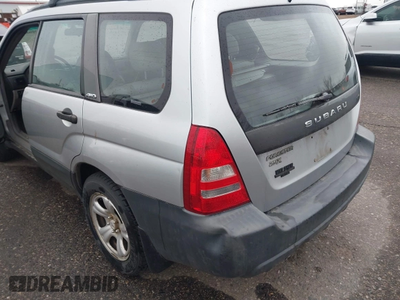 2003 Subaru Forester X with VIN JF1SG63633G728520, listed as a IAAI auction lot 41808658 with 104,084 mi miles. Bid and sale history available at carsss.com. Image 6.