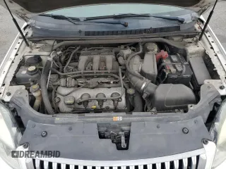 2008 Mercury Sable Premier z VIN 1MEHM42WX8G625135, wystawiony jako Copart lot #52001865 z przebiegiem 182 725 mil mil oraz Szkody całkowita. Historia ofert i sprzedaży dostępna na DreamBid. Obrazek 11.