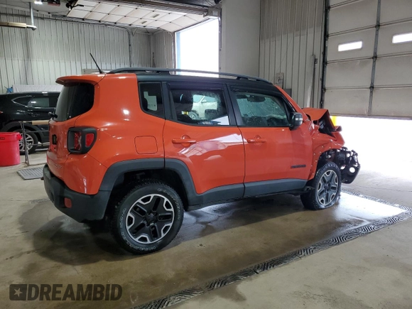 2015 Jeep Renegade Trailhawk with VIN ZACCJBCTXFPB80067, listed as a Copart auction lot 64927985 with Not provided miles and Salvage title. Bid and sale history available at DreamBid. Image 3.