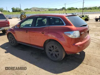 2008 Mazda CX-7 Grand Touring z VIN JM3ER29LX80190946, wystawiony jako Copart lot #61860475 z przebiegiem 136 545 mil mil oraz Czysty tytuł • Clean title. Historia ofert i sprzedaży dostępna na DreamBid. Obrazek 2.