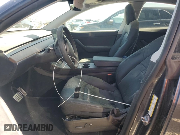 2022 Tesla Model Y Performance with VIN 7SAYGDEF1NF466938, listed as a Copart auction lot 53678045 with 50,135 mi miles and Salvage Title. Bid and sale history available at DreamBid. Image 7.