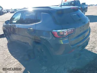 2020 Jeep Compass Latitude w/Sun/Safety Pkg with VIN 3C4NJCBB8LT141103, listed as a IAAI auction lot 41263757 with 128,272 mi miles. Bid and sale history available at carsss.com. Image 3.