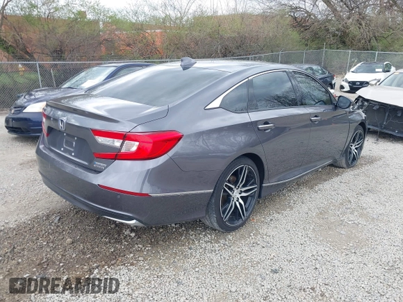 2021 Honda Accord Touring with VIN 1HGCV3F90MA001513, listed as a IAAI auction lot 41939003 with 107,246 mi miles and . Bid and sale history available at DreamBid. Image 4.