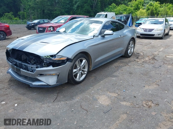 2021 Ford Mustang EcoBoost z VIN 1FA6P8TH1M5121107, wystawiony jako IAAI lot #42204097 z przebiegiem 51 542 mil mil oraz . Historia ofert i sprzedaży dostępna na DreamBid. Obrazek 18.