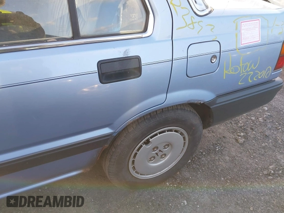1986 Honda Civic z VIN JHMAK7439GS063929, wystawiony jako IAAI lot #41594413 z przebiegiem Nie podano mil oraz . Historia ofert i sprzedaży dostępna na DreamBid. Obrazek 6.