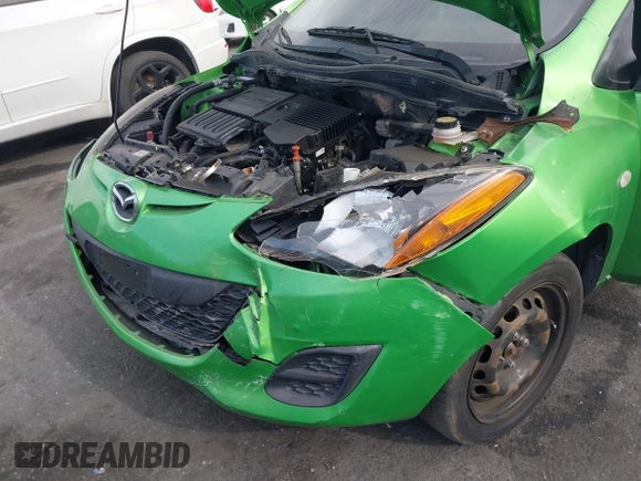 2012 Mazda 2 Sport with VIN JM1DE1KZ4C0140559, listed as a IAAI auction lot 41265959 with 139,364 mi miles and . Bid and sale history available at DreamBid. Image 6.
