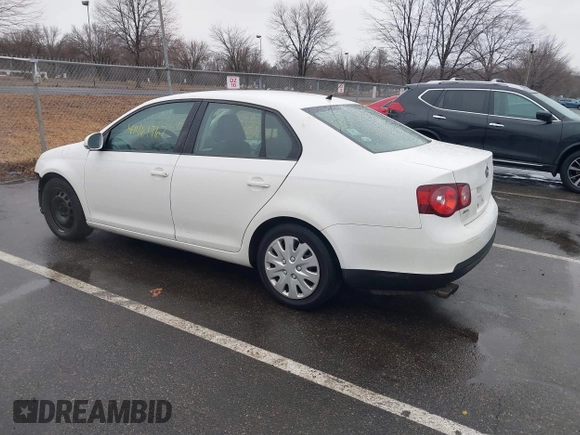 2009 Volkswagen Jetta S z VIN 3VWJZ71K49M129501, wystawiony jako IAAI lot #41461767 z przebiegiem 250 552 mil mil oraz . Historia ofert i sprzedaży dostępna na DreamBid. Obrazek 3.