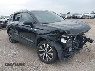 2024 Volkswagen Taos SE z VIN 3VVSX7B27RM064253, wystawiony jako IAAI lot #42117419 z przebiegiem 2 421 mil mil oraz . Historia ofert i sprzedaży dostępna na DreamBid. Obrazek 1.