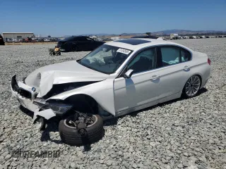 2014 BMW 3 Series 328i with VIN WBA3C1C53EK112799, listed as a Copart auction lot 61493585 with Not provided miles and Salvage title. Bid and sale history available at DreamBid. Image 1.