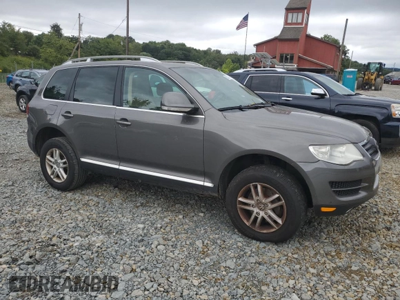2010 Volkswagen Touareg VR6 with VIN WVGBF7A91AD001497, listed as a Copart auction lot 68234794 with 173,826 mi miles and Clean Title. Bid and sale history available at DreamBid. Image 4.