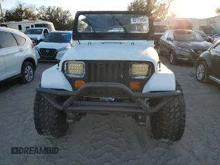 1989 Jeep Wrangler with VIN 2J4FY29T2KJ154190, listed as a Copart auction lot 82113494 with 131,026 mi miles and Clean Title. Bid and sale history available at carsss.com. Image 5.