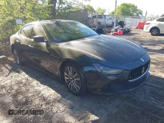 2015 Maserati Ghibli z VIN ZAM57XSA1F1156269, wystawiony jako IAAI lot #42040150 z przebiegiem 137 576 mil mil oraz . Historia ofert i sprzedaży dostępna na DreamBid. Obrazek 1.