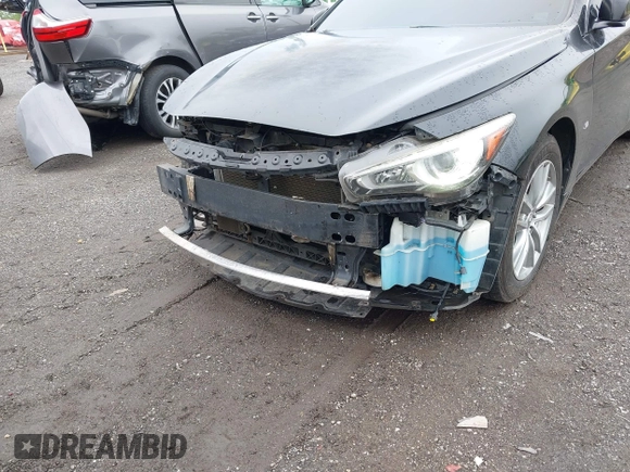 2014 Infiniti Q50 Premium z VIN JN1BV7AR2EM705630, wystawiony jako IAAI lot #42258650 z przebiegiem 109 151 mil mil oraz . Historia ofert i sprzedaży dostępna na DreamBid. Obrazek 18.