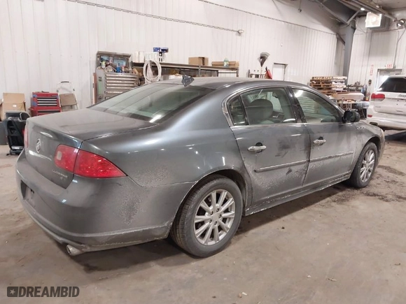 2011 Buick Lucerne CXL with VIN 1G4HC5EM4BU113198, listed as a IAAI auction lot 41381766 with 187,323 mi miles. Bid and sale history available at carsss.com. Image 4.
