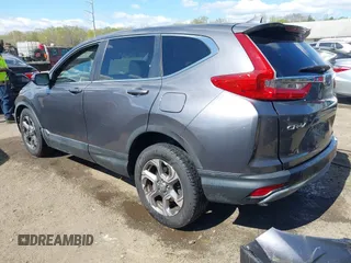 2017 Honda CR-V EX with VIN 2HKRW2H5XHH678674, listed as a IAAI auction lot 42039505 with 124,891 mi miles. Bid and sale history available at carsss.com. Image 3.