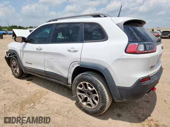 2020 Jeep Cherokee Trailhawk z VIN 1C4PJMBN0LD553823, wystawiony jako Copart lot #59796745 z przebiegiem 101 916 mil mil oraz Szkoda całkowita • Salvage title. Historia ofert i sprzedaży dostępna na DreamBid. Obrazek 2.