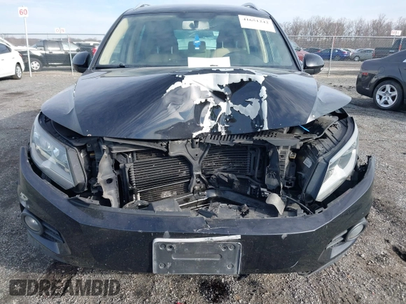 2012 Volkswagen Tiguan SE with VIN WVGAV7AX3CW531264, listed as a IAAI auction lot 41651242 with 190,669 mi miles and . Bid and sale history available at DreamBid. Image 6.
