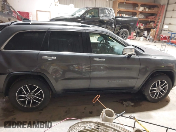 2021 Jeep Grand Cherokee Limited z VIN 1C4RJFBG7MC645198, wystawiony jako IAAI lot #41829331 z przebiegiem 62 838 mil mil oraz . Historia ofert i sprzedaży dostępna na DreamBid. Obrazek 13.