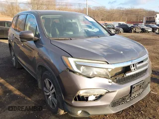 2016 Honda Pilot EX-L with VIN 5FNYF6H75GB053780, listed as a IAAI auction lot 41340590 with 203,190 mi miles. Bid and sale history available at carsss.com. Image 6.