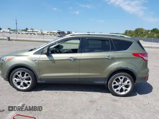 2013 Ford Escape Titanium with VIN 1FMCU0J94DUB06332, listed as a IAAI auction lot 41824742 with 92,633 mi miles. Bid and sale history available at carsss.com. Image 14.