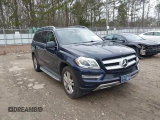 2015 Mercedes-Benz GL-Class GL 450 with VIN 4JGDF6EE9FA513009, listed as a IAAI auction lot 41311164 with 121,185 mi miles. Bid and sale history available at carsss.com. Image 1.